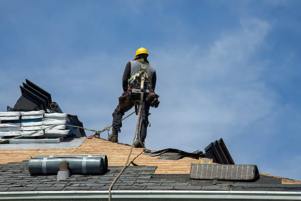Professional Gutter Installation technician working in Erie, KS